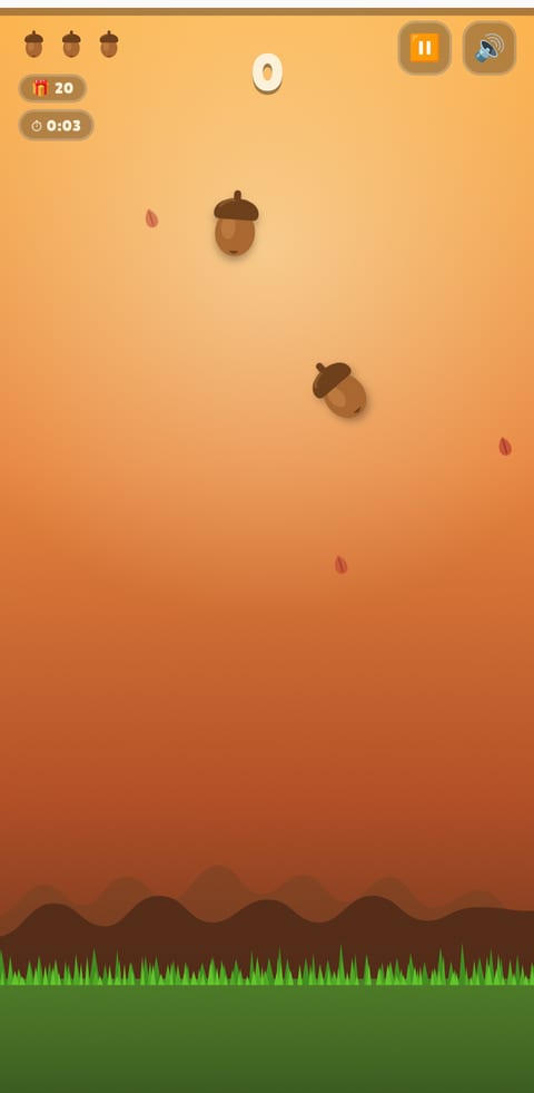 Gameplay: acorns falling toward the forest floor with the score and lives shown